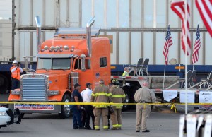 Photo shows Nov. 15, 2012 Show of Support parade float and Union Pacific train crash that caused the death of four military veterans and injured 14 people, Photo credit: James Durbin