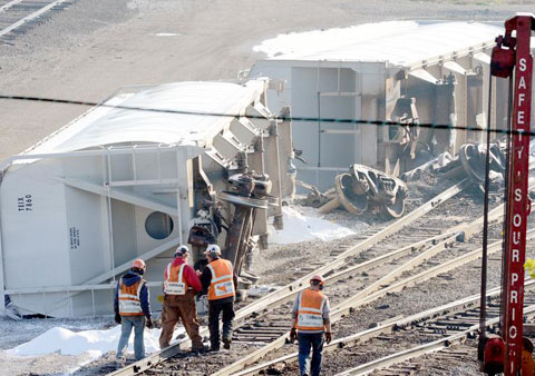 Three rail cars belonging to the Wheeling and Lake Erie Railroad derailed and then tipped over in a rail yard in Canton, OH on April 26, 2013. Photo credit: Cantonrep.com