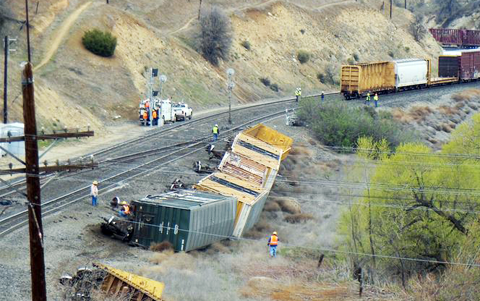 Several rail cars lay tipped over on their sides after a major Union Pacific train derailment just west of Tehachapi, CA on April 7, 2013. Photo credit: Phil Cornyn / Tehachapi News