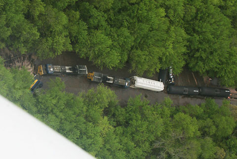 An eastbound Canadian Pacific train derailed in Charles City, IA when a section of track was washed out by recent flooding on May 21, 2013. Photo credit: (Arian Schuessler/The Globe Gazette.