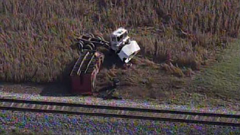 A dump truck rests about .2 of a mile down the tracks after a collision with a Norfolk Southern train at a private rail crossing in Cleveland, NC on September 2013. Photo credit: AirStar