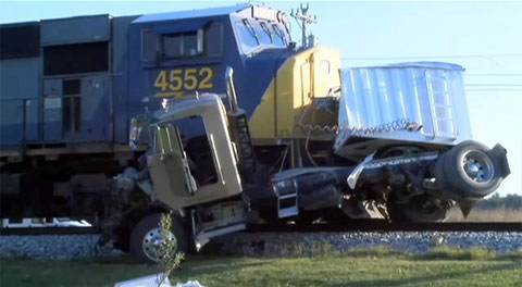 A semi truck driver was killed in a crash with a CSX train in Henderson County, KY on October 9, 2013.