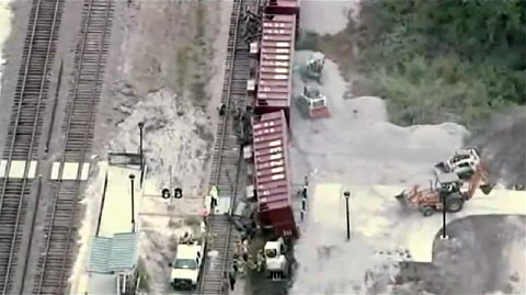 A railroad worker was killed when he was crushed by a rail car filled with tons of gravel in train accident and derailment in Sanford, FL on October 24, 2013.